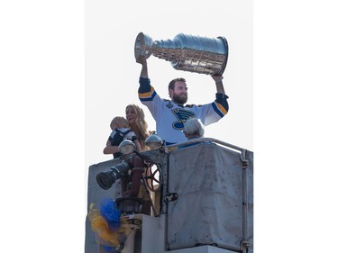 St. Louis Blues star Ryan O'Reilly holds the Stanley Cup over his head as he's carried through his hometown, Seaforth, during a parade Thursday morning. (MAX MARTIN, The London Free Press)