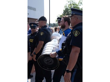 Ryan O'Reilly heads inside the Seaforth Arena for a photo session with fans. (MAX MARTIN, The London Free Press)