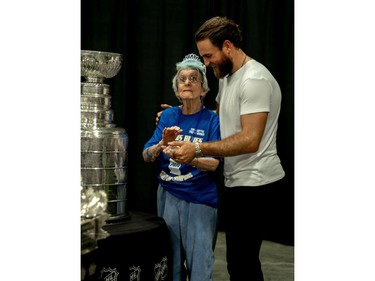 Ryan O'Reilly and his grandmother, Deirdre, pose for a photo with the Stanley Cup. (MAX MARTIN, The London Free Press)