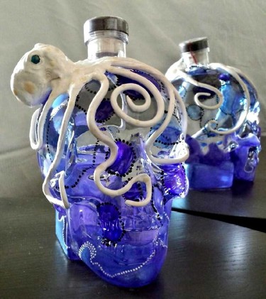 Tattoo artist and founder of Neon Crab Tattoos, Will Graham, has also dabbled a little in sculpting, once commissioned to design a special edition of actor Dan Ackroyd's Crystal Head Vodka for a Toronto fair, wrapping a clay octopus around one of the unique skull bottles.