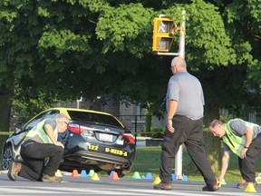 Members of the Special Unit Investigation remained at a scene on Southdale Road at Verulam Street as part of a probe by the Ontario police watchdog into a pursuit by London police that resulted in two citizens being hurt and two others arrested in July 2019. (JONATHAN JUHA, The London Free Press)