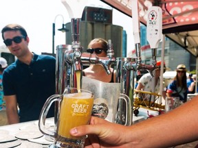 Another craft beer is pulled for the Roundhouse Craft Beer Festival in Toronto.