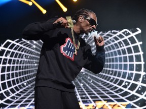Snoop Dogg, along with Shaggy, Ma$e, Ginuwine and Tone Loc, play Rock the Park Friday at Harris Park.