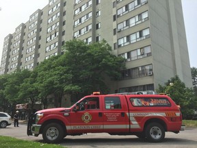 A fire broke out at a 13-storey apartment building at 95 Fiddlers Green Rd. Monday afternoon. (Patrick Maloney/The London Free Press)