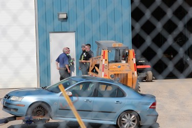 A car London police were examining after reports of a shooting near London's Oakridge neighbourhood was towed to Ross' towing yard. Photo taken Friday July 26, 2019. (Dale Carruthers/The London Free Press)