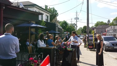 Prime Minister Justin Trudeau greets people along the road in Wortley Village. (Dan Brown, The London Free Press)