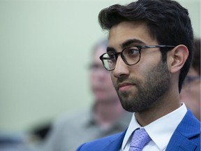 Amir Farahi awaits his turn to speak at city hall in London, Ont. on Friday July 26, 2019. (Derek Ruttan/The London Free Press)