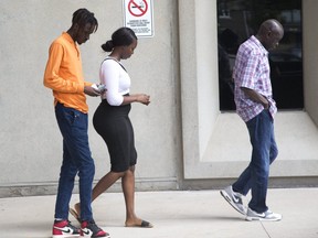 Family members of Suzan Jacob leave court after delivering victim impact statements in London. Juha Kuol  was found guilty of manslaughter in the death of Jacob. (Derek Ruttan/The London Free Press)