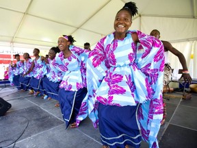 The Neema Children's Choir of Uganda dance and sing during a performance at Sunfest in Victoria Park on Sunday July 7, 2019. London's music festivals are one reason the city has been designated as a "city of music" by UNESCO. (Mike Hensen/The London Free Press)