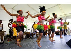 The Neema Children's Choir of Uganda dance and sing during their performance at Sunfest in Victoria Park on Sunday, July 7, 2019. All the dancers and singers are orphans being raised by a charity in Uganda that has more than 250 children in its care. Mike Hensen/The London Free Press