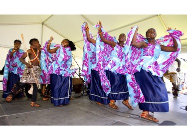 The Neema Children's Choir of Uganda dance and sing during their performance at Sunfest in Victoria Park on Sunday, July 7, 2019. All the dancers and singers are orphans being raised by a charity in Uganda that has more than 250 children in its care. Mike Hensen/The London Free Press