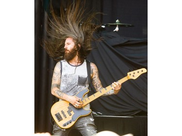 Matt DiRito, bassist of the band Pop Evil, performs Thursday, July 11, 2019 at the Start.ca Rock the Park in Harris Park.  Mike Hensen/The London Free Press