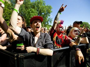 A large crowd shows up early at Harris Park for the opening act Pop Evil at Start.ca's Rock the Park in London Thursday, July 11, 2019.  (Mike Hensen/The London Free Press)