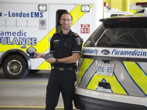 Dustin Carter, the Middlesex-London Paramedic Service's superintendent of Community Paramedicine, displays some of the blue tooth enabled self management devices used by people in London. (Derek Ruttan/The London Free Press)