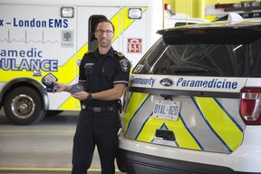 Dustin Carter, the Middlesex-London Paramedic Service's superintendent of Community Paramedicine, displays some of the blue tooth enabled self management devices used by people in London. (Derek Ruttan/The London Free Press)