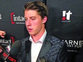 Mitch Marner holds court with reporters last night at his annual charity event.   LANCE HORNBY/TORONTO SUN