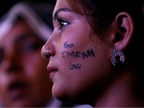 A supporter of an opposition political party listens to the speech of leaders during a countrywide protest called "Black Day" against the government of prime minister Imran Khan, in Karachi, Pakistan July 25, 2019.