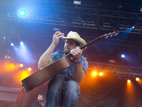 Dean Brody plays for a screaming crowd at Rock The Park presents Gone Country Music Festival in Harris Park in London on July 23, 2014. (Free Press file photo)