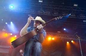 Dean Brody plays for a screaming crowd at Rock The Park presents Gone Country Music Festival in Harris Park in London on July 23, 2014. (Free Press file photo)