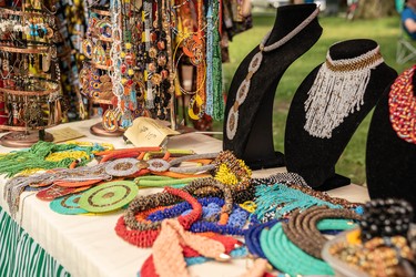 Handmade jewelry for sale at a Sunfest booth.