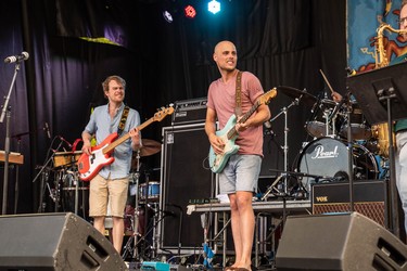 Members of Marutyri perform on the Stingray Stage Saturday afternoon. The group is an eight-piece funk-fusion band from the Netherlands.