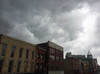 Storm clouds gather in the sky above Dundas Street in London Friday. (Dale Carruthers/The London Free Press)
