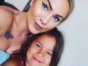 Porsche Clark, 27, and daughter Skyla Clark, 9, were critically hurt when their taxi and an OPP vehicle collided at Southdale Road and Verulam Street in London as police pursued two Sarnia bank robbery suspects Sunday, July 28. (Facebook photo)