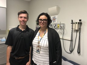 Children's Hospital pediatric neurologist Andrea Andrade, right, with 14-year-old Ethan, the first pediatric epilepsy patient in Ontario to undergo a robot-assisted brain surgery to place electrodes in his brain. (Jennifer Bieman/The London Free Press)
