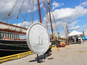 A replica of a Canadian dime is set up on in Sarnia Harbour next to the Bluenose II at the Tall Ships Celebration in Sarnia. The original Bluenose schooner has been featured on the dime since 1937. (Paul Morden/The Observer )