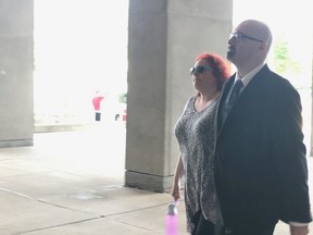 Ryan Jarvis, who has convicted of using a pen camera to film his students' breasts,  entered the London courthouse with an unknown woman before before final submissions by the Crown and defence Thursday. Jarvis will be sentenced on August 27. (HEATHER RIVERS, The London Free Press)
