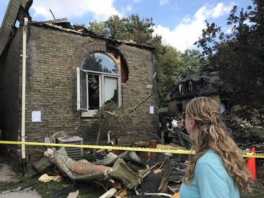 Jessica Jaime, 38, said the reconstruction of her house, directly next to the epicentre of Wednesday night’s explosion at 450 Woodman Ave., will take a “year or more.” She and her husband, Mario, 44, and their two kids Zoey and Eric, four and two, are staying with family in the interim. (Sebastian Bron/The London Free Press)
