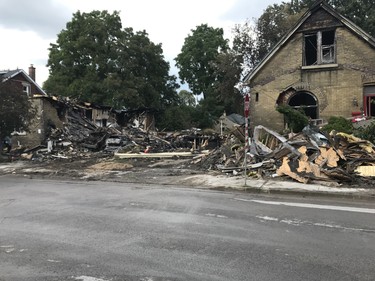 Half of Jessica Jaime’s house (left) was burnt to rubble after the explosion. She and her family were unable to retrieve any personal belongings Friday. (Sebastian Bron/The London Free Press)