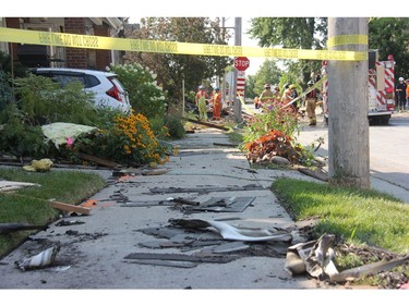 Cleaning efforts were underway Friday on Woodman Avenue, two days after a home on the street was destroyed and several others damaged after a vehicle hit a gas line causing an explosion. (JONATHAN JUHA, The London Free Press)