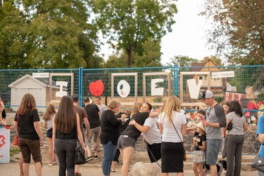 Old East Village residents gather at a neighbourhood block party two weeks after the explosion that damaged several homes in the neighbourhood. (Max Martin, The London Free Press)