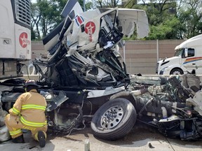 A trucker has been charged three tractor-trailers collided, sending three to hospital, on Highway 402 West in Sarnia Tuesday, Lambton OPP say. (Supplied)