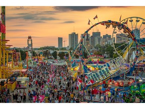 Some 156,000 lights brighten the Midway and 75 rides attract guests at the Western Fair.