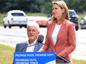 Caroline Mulroney, Minister of Transportation and MPP Rick Nicholls, left, announce the Ontario government is widening Highway 3 from two to four lanes in the towns of Essex and Leamington.