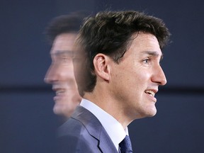 Canada's Prime Minister Justin Trudeau speaks during a news conference about the government's decision on the Trans Mountain Expansion Project with Finance Minister Bill Morneau and Environment Minister Catherine McKenna in Ottawa, Ontario, Canada, June 18, 2019. (REUTERS/Chris Wattie)