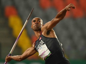 Londoner Damian Warner competes in the men's javelin throw as part of the decathlon during the 2019 Pan-American Games in Lima, Peru on August 7, 2019. (Photo by LUIS ROBAYO / AFP)
