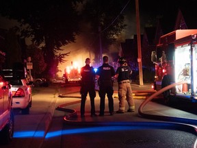 Image from the area where an overnight natural gas explosion and fires occurred after a car going the wrong way on a one-way street slammed into a home on Woodman Avenue. Photo taken Aug. 14, 2019. (Max Martin, The London Free Press)