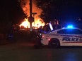 London firefighters battle a major fire on Woodman Avenue at Queens Avenue in Old East Village after a car slammed into a house and severed a gas line that caused an explosion (Joe Belanger, The London Free Press)