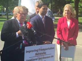 London Mayor Ed Holder, London North Centre MP Peter Fragiskatos and London West MP Kate Young announce $123 million in federal funding for transit projects in the city.