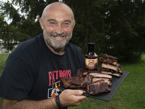 George Kefalidis of Fat Boys Barbecue will be selling ribs at Rib Fest in London, Ont. on Tuesday July 30, 2019. Derek Ruttan/The London Free Press/Postmedia Network