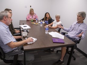 Clockwise from bottom left--London Free Press journalists Randy Richmond and Megan Stacey discuss the city's employment situation with panelists Amanda Wilcox, Carol Stewart, Sue Wilson and Don Kerr in London, Ont. on Wednesday July 24, 2019. Derek Ruttan/The London Free Press/Postmedia Network