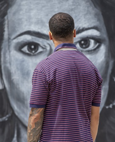 The eyes of singer Sarah McLachlan look back at Preston Haynes of London as he admires a gallery of chalk drawings  at The London Rib Fest and Craft Beer Festival in Victoria Park in London, Ont. on Monday August 5, 2019. "They're really good," commented Haynes."Much better that I could do." The Sarah McLachlan image was drawn on a 2.44 meter by 2.44 meter masonite chalk board canvas by Londoner Samantha Vincent. The chalk drawing event was staged by Expressions In Chalk.  Derek Ruttan/The London Free Press/Postmedia Network