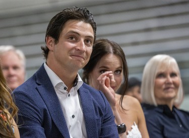 Scott Moir and Tessa Virtue listen to reminiscences by their coaches Marie-France Dubreuil and Patrice Lauzon before taking the stage themselves to unveil Moir's Canada Walk of Fame Plaque at the Ilderton Arena in Ilderton, Ont. on Wednesday August 7, 2019. Derek Ruttan/The London Free Press/Postmedia Network