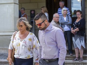 Joshua Houston leaves the Elgin County Courthouse with his mother Sheri Houston in St. Thomas on Friday. (Derek Ruttan/The London Free Press)