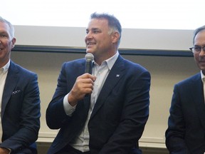 CFL player safety boss Kevin McDonald, left, Eric Lindros and former Olympic downhill skier Steve Podborski join a panel discussion at the 2018 See The Line concussion symposium at Western University in London. (Derek Ruttan/The London Free Press)