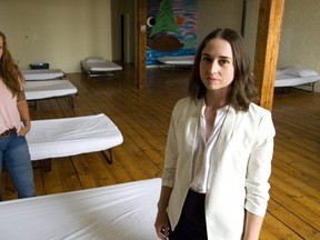 Atlohsa's Terri King, the Team lead for Resting Space and Andrea Jibb, the Indiginous Community planner (l-r) show off some of their resting space beds, overnight accommodations for 10 Londoners. They've been at capacity since they started in the spring.  (Mike Hensen/The London Free Press)