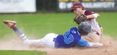 Justin Humanay of Quebec steals second as Badgers' Anthony Polowick can't hold onto the throw from home during their semi-final game. The Badgers lost 6-1 and will play in the bronze medal game of the Canadian National U18 tournament in London, Ont.   Mike Hensen/The London Free Press/Postmedia Network